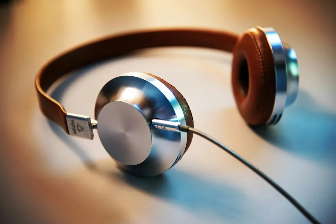 Headphones resting on a desk